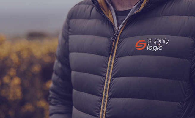 Person wearing Supply Logic jacket